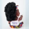 The Aimee Doll sitted in Black Afro Hair and Branded Jumpsuit - dark skin color The Aimee Doll in Black Afro Hair and Branded Jumpsuit - dark skin color