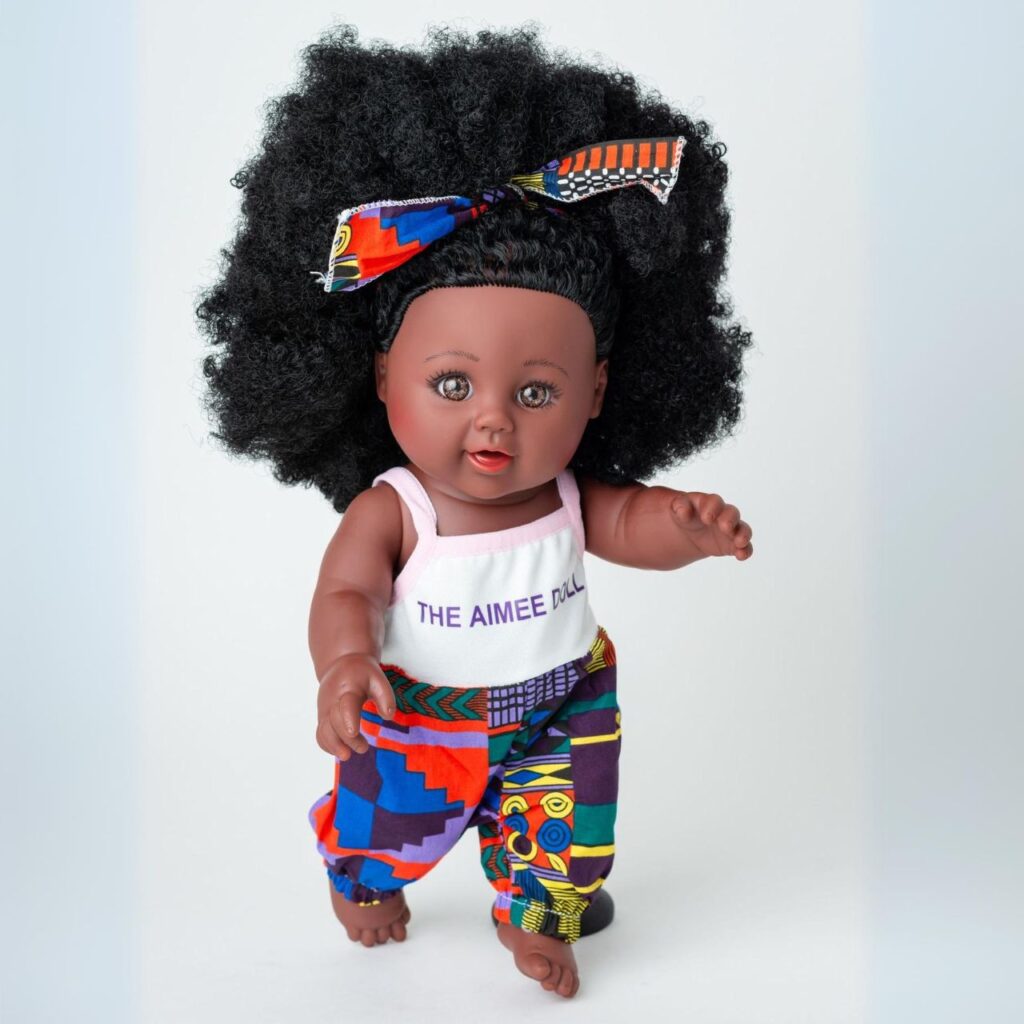 The Aimee Doll in Black Afro Hair and Branded Jumpsuit - dark skin color