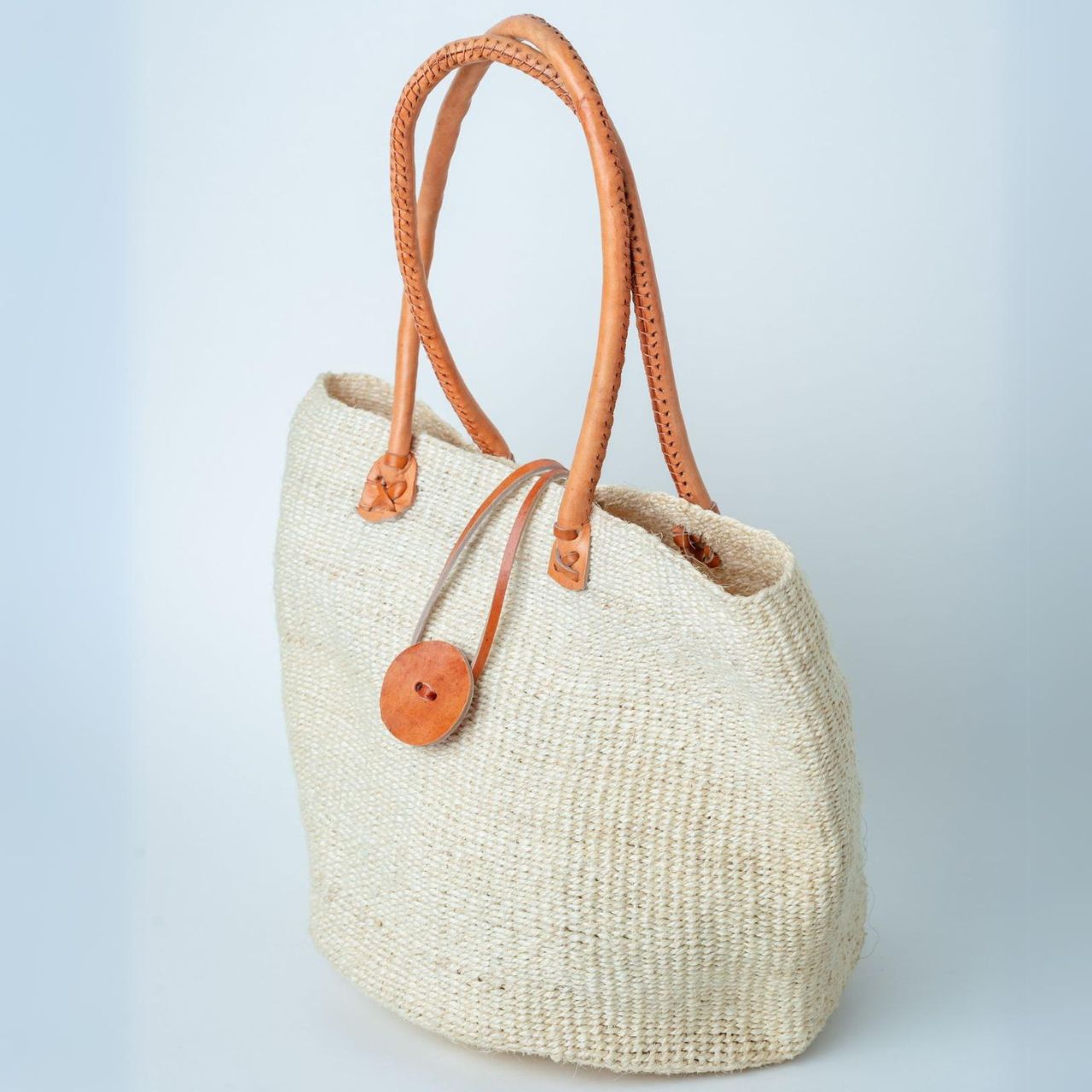 Beige Sisal Basket Bag with leather handles side Beige Sisal Basket Bag with leather handles side