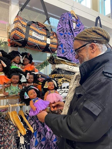 Customer shopping Collected Aimee Doll in-store