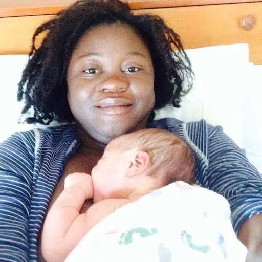 Aimee postpartum with her baby